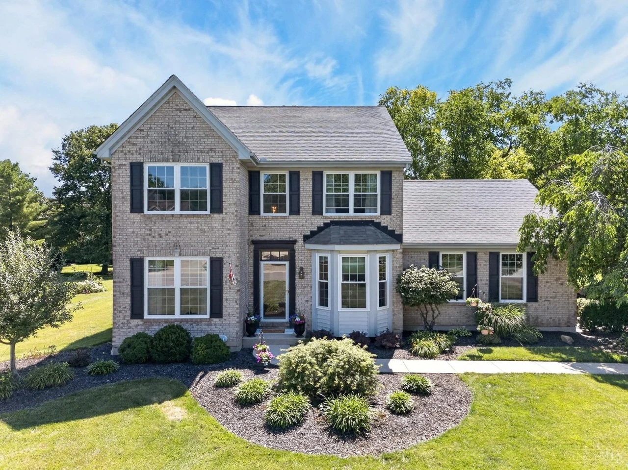 Brick home at 5386 Harvestdale Drive in Mason, listed by Tyler Smith and now sold